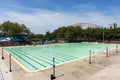 Empty Astoria Pool during Summer with the Hell Gate Bridge in the Background in Astoria Queens New York