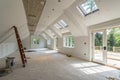 Empty attic rooms after ceiling and wall work completed Royalty Free Stock Photo