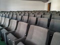 Empty auditorium audience chairs aligned in amphitheater in college university or conference company room for presentations