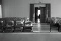 Empty auditorium with beige chairs, theatre or conference hall Black and white photo . Royalty Free Stock Photo