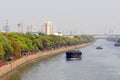 Empty barge on channel in China village