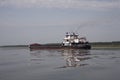 The empty barge floating on the river. Royalty Free Stock Photo