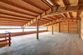 Empty barn inside with wooden trim Royalty Free Stock Photo