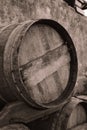 Empty barrels alcohol of whiskey wait to be filled outside a distillery. Royalty Free Stock Photo