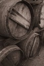 Empty barrels alcohol of whiskey wait to be filled outside a distillery. Royalty Free Stock Photo