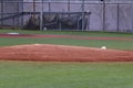 Empty baseball pitchers mound with a white rosin bag Royalty Free Stock Photo