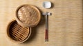 Empty basket of dim sum made by bamboo material and chopsticks. Chinese Traditional cuisine concept. Dumplings Dim Sum in bamboo Royalty Free Stock Photo