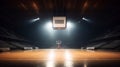 Empty basketball arena with floodlights and fan seats