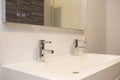 Empty Bathroom sink modern design silver silver tap Royalty Free Stock Photo