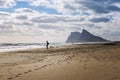 A man standing on the beach and watching the ocean. Royalty Free Stock Photo