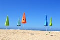 Empty beach with closed parasols Royalty Free Stock Photo