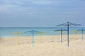 Empty Beach and Parasols Royalty Free Stock Photo