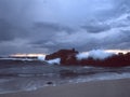 Empty beach before storm at sunset Royalty Free Stock Photo