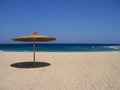 Empty beach with sunshade Royalty Free Stock Photo