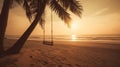 Empty beach swing in golden light at sunset or sunrise. Tranquil tropical holiday scene Royalty Free Stock Photo