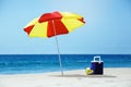 Empty beach with umbrella sea accesorries Royalty Free Stock Photo