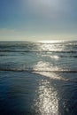 Empty Beach - Vertical - Sunset on Waves Royalty Free Stock Photo