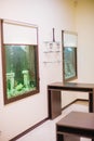 Empty beautiful room in day spa with aquarium and fish Royalty Free Stock Photo