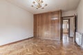 Empty bedroom with built-in wardrobe of four bodies and French Royalty Free Stock Photo