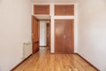 Empty bedroom with fitted wardrobes with trunks Royalty Free Stock Photo