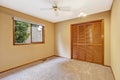 Empty bedroom interior in soft peach color Royalty Free Stock Photo