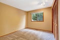 Empty bedroom interior in soft peach color Royalty Free Stock Photo