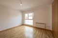 Empty bedroom with white aluminum windows, oak parquet flooring Royalty Free Stock Photo