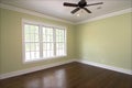 Empty bedroom with windows