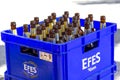 Empty beer bottles are placed in the plastic beer case Royalty Free Stock Photo