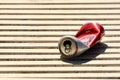 Empty beer can on a bench in a park, Warsaw, Poland Royalty Free Stock Photo