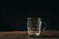 Empty beer glass mug on a wooden table Royalty Free Stock Photo