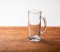 Empty beer mug on wood Royalty Free Stock Photo