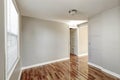 Empty beige hallway interior and hardwood floor