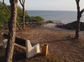Empty bench on a beautiful sea wiew in golden evening light