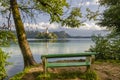 Empty bench on a Bled lake Royalty Free Stock Photo