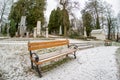 Empty bench on cemetery