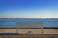 Empty Bench & Fishing Pole Royalty Free Stock Photo