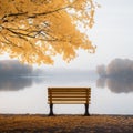 an empty bench in front of a lake