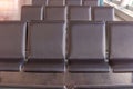 empty bench in the hall at international airport Royalty Free Stock Photo