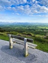 An empty bench near the edge of the road at Vee Pass, a v-shaped turn on the road leading to a gap in the Knockmealdown mountains