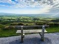 An empty bench near the edge of the road at Vee Pass, a v-shaped turn on the road leading to a gap in the Knockmealdown mountains