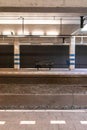 An empty bench on one of the platforms of Station Rijswijk The Netherlands Royalty Free Stock Photo