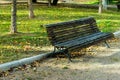 Empty bench in the park next to the river