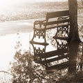 Empty bench in the park after raining Royalty Free Stock Photo