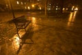 Empty bench in the rain