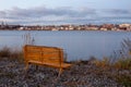 Empty bench by the river Royalty Free Stock Photo