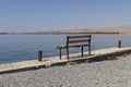 An empty bench by the sea. Royalty Free Stock Photo