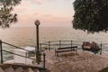 empty bench at sea beach on sunset Royalty Free Stock Photo