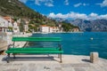 Empty green bench in Perast town in Montenegro