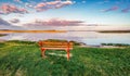 Empty bench on the shore of Svityaz lake, Shatsky National Park, Volyn region, Ukraine. Royalty Free Stock Photo